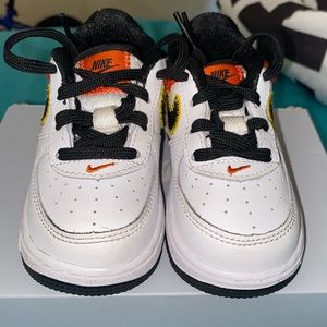 Nike. Size 6c. Orange. Black and white